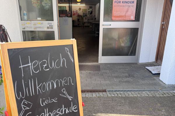 Schild Herzlich Willkommen